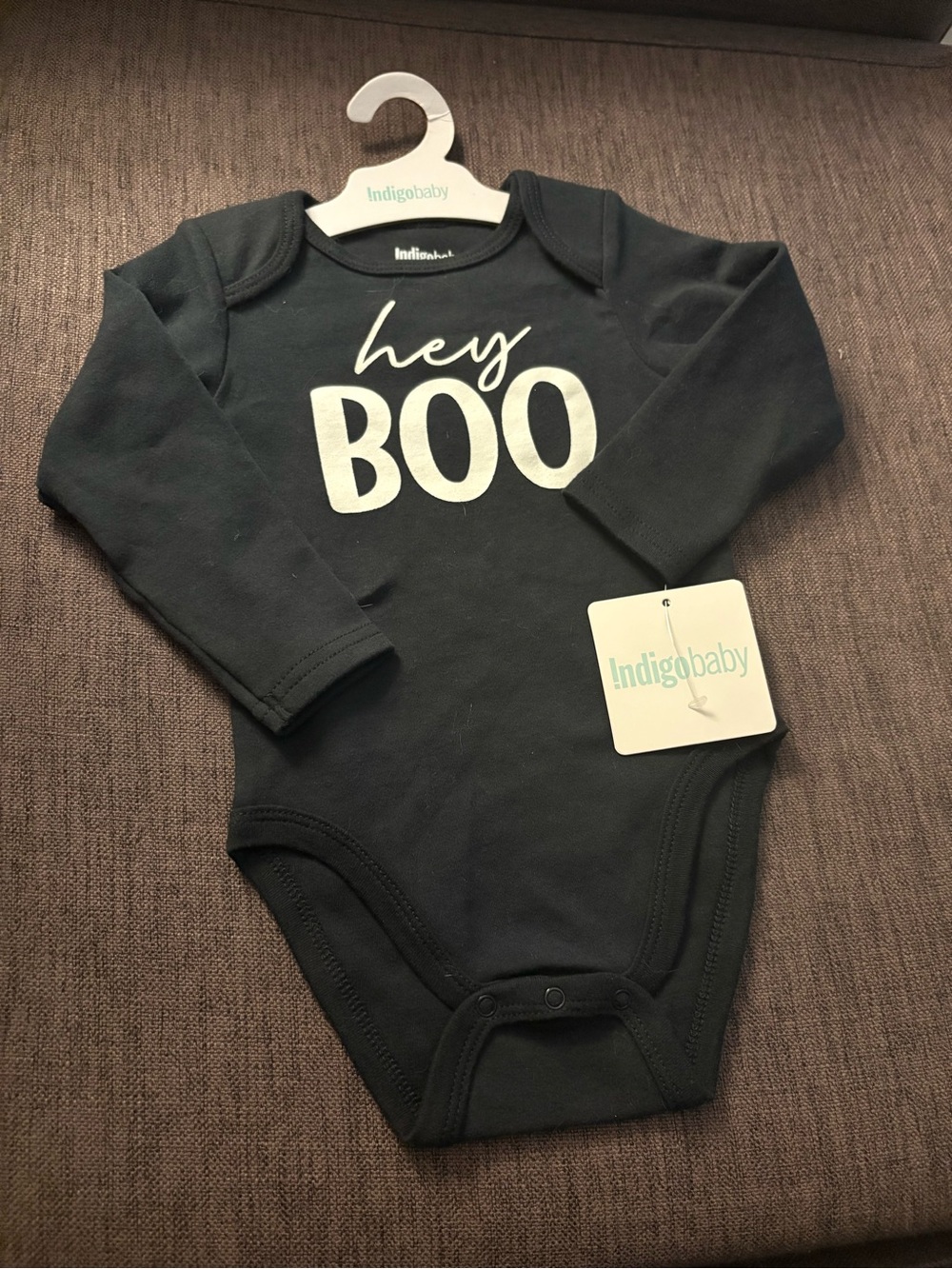 Brand new with tags - Black Long-Sleeve Baby One-Piece with "hey BOO"